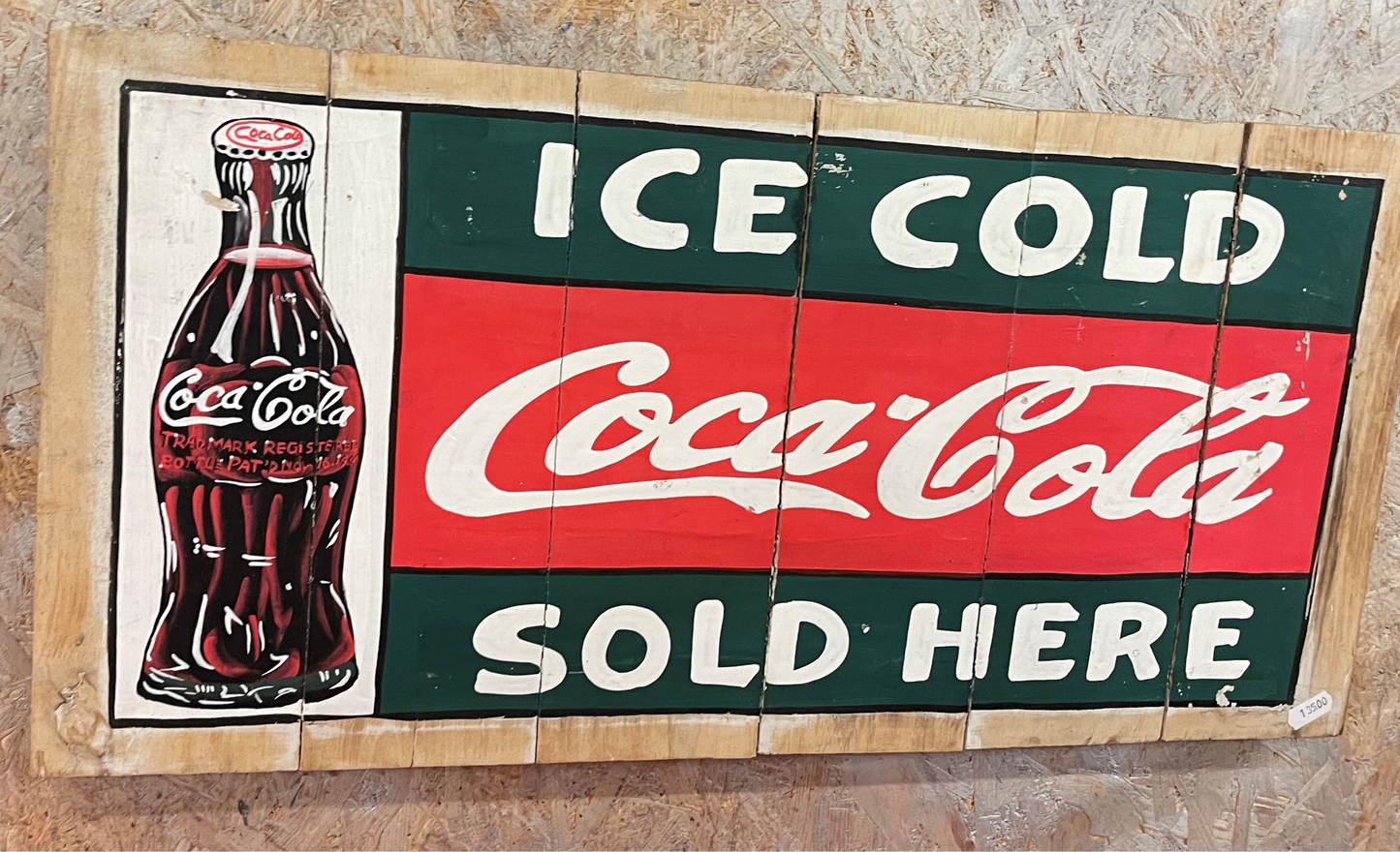 Coca Cola træ skilt
