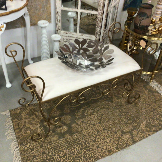 sidde puf med guld belagt stel